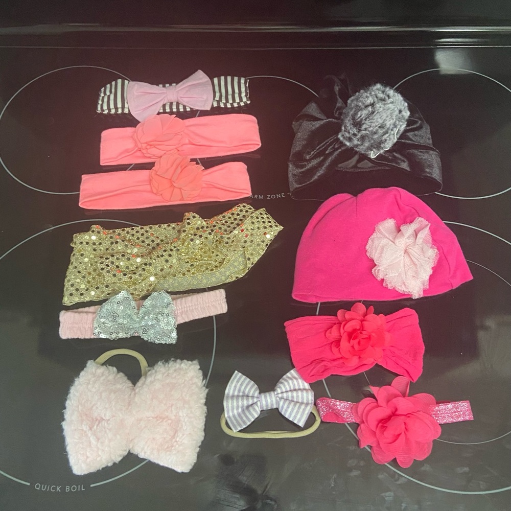 Girl different headbands/hats